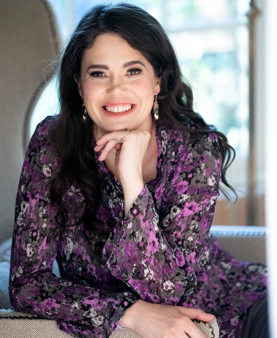 Headshot of Katie Chambers, who is looking at the camera and smiling.